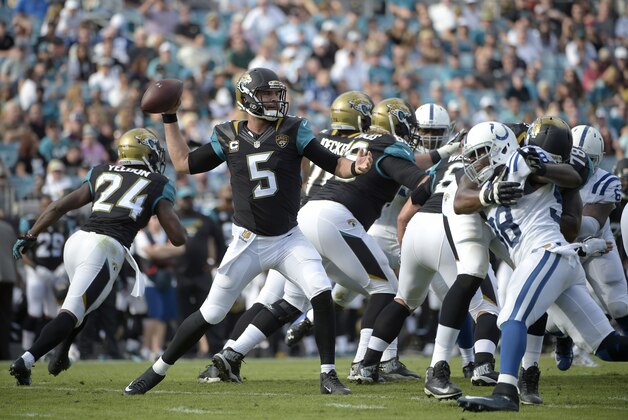 Jacksonville Jaguars quarterback Blake Bortles (5) throws a pass during the first half of an NFL football game against the Indianapolis Colts in Jacksonville, Fla., Sunday, Dec. 13, 2015. (AP Photo/Phelan M. Ebenhack)