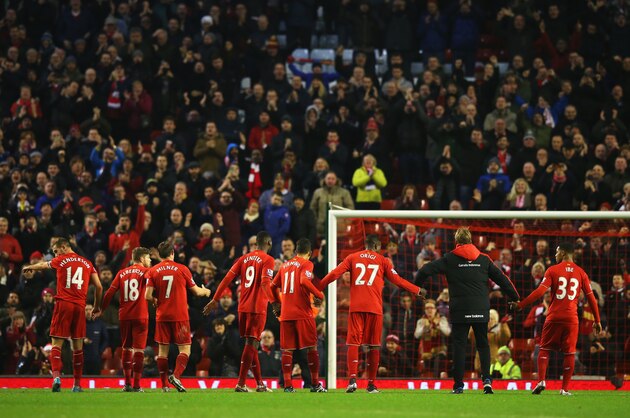 LIVERPOOL, ENGLAND - DECEMBER 13:  Jurgen Klopp, manager of Liverpool and player salute The Kop after the Barclays Premier League match between Liverpool and West Bromwich Albion at Anfield on December 13, 2015 in Liverpool, England.  (Photo by Alex Livesey/Getty Images)