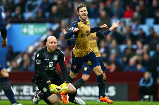 BIRMINGHAM, ENGLAND - DECEMBER 13:  Aaron Ramsey of Arsenal celebrates as he scores their second goal past Brad Guzan of Aston Villa (L) during the Barclays Premier League match between Aston Villa and Arsenal at Villa Park on December 13, 2015 in Birmingham, England. (Photo by Clive Mason/Getty Images)