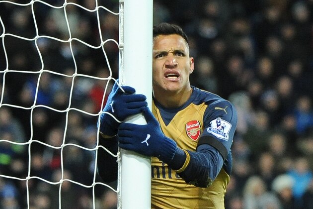 Arsenal’s Alexis Sanchez reacts after missing a goal opportunity during the English Premier League soccer match between West Bromwich Albion and Arsenal at the Hawthorns, West Bromwich, England, Saturday, Nov. 21, 2015. (AP Photo/Rui Vieira)