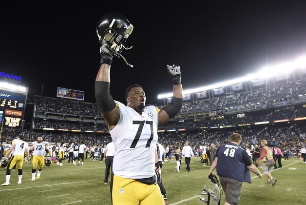 Pittsburgh Steelers tackle Marcus Gilbert celebrates the teams defeat of the San Diego Chargers in an NFL football game Monday, Oct. 12, 2015, in San Diego. (AP Photo/Denis Poroy)