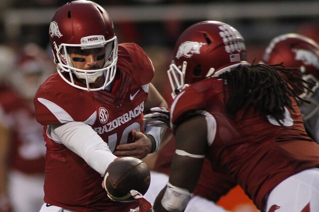 Arkansas' Brandon Allen (10) hands off to Alex Collins (3) during the second half of an NCAA college football game against Tennessee-Martin, Saturday, Oct. 31, 2015, in Fayetteville, Ark. Arkansas won 63-28. (AP Photo/Samantha Baker)