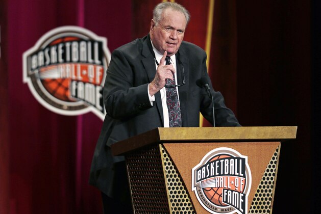 Basketball Hall of Fame inductee Tommy Heinsohn gestures during the enshrinement ceremony for the Class of 2015 of the Naismith Memorial Basketball Hall of Fame in Springfield, Mass., Friday, Sept. 11, 2015. Heinsohn initially entered the Hall of Fame as a player in 1986, before entering as a coach this year. (AP Photo/Charles Krupa)