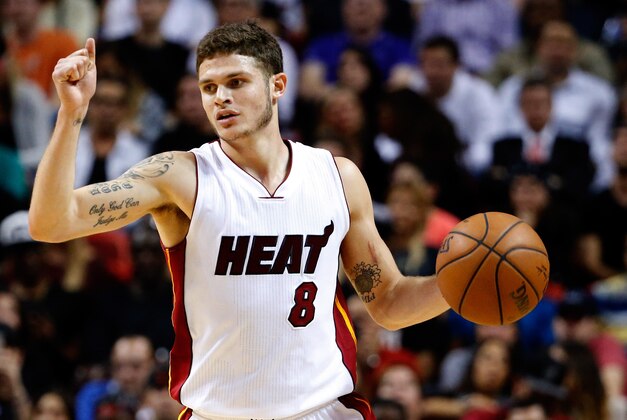 Nov 23, 2015; Miami, FL, USA; Miami Heat guard Tyler Johnson (8) dribbles the ball against the New York Knicks during the second half at American Airlines Arena. The Heat won 95-78. Mandatory Credit: Steve Mitchell-USA TODAY Sports