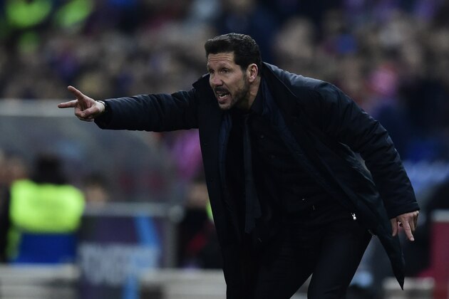 Atletico Madrid's Argentinian coach Diego Simeone gestures during the Spanish league football match Club Atletico de Madrid vs Athletic Club Bilbao at the Vicente Calderon stadium in Madrid on December 13, 2015.   AFP PHOTO / JAVIER SORIANO / AFP / JAVIER SORIANO        (Photo credit should read JAVIER SORIANO/AFP/Getty Images)