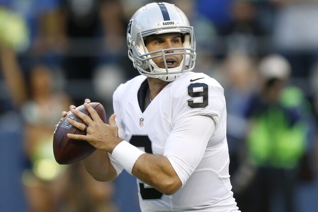 Oakland Raiders quarterback Christian Ponder passes in the first half of a preseason NFL football game against the Seattle Seahawks, Thursday, Sept. 3, 2015, in Seattle. (AP Photo/Stephen Brashear)