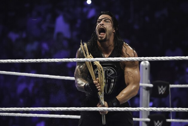MIAMI, FL- SEPTEMBER 01: Roman Reigns reacts during the WWE Smackdown on September 1, 2015 at the American Airlines Arena in Miami, Florida.  (Photo by Ron ElkmanSports Imagery/Getty Images)