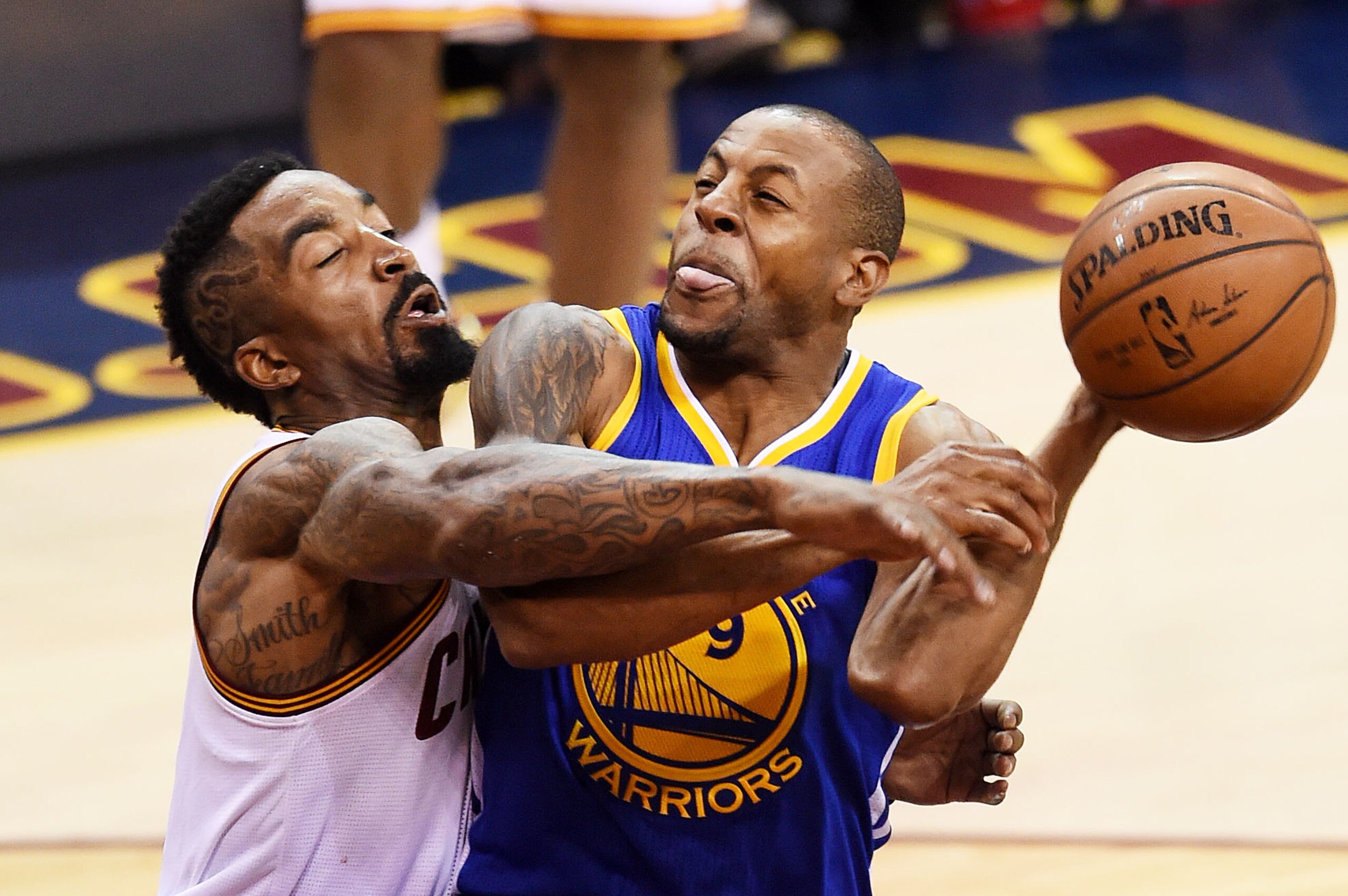 CLEVELAND, OH - JUNE 16:  Andre Iguodala #9 of the Golden State Warriors goes up against J.R. Smith #5 of the Cleveland Cavaliers during Game Six of the 2015 NBA Finals at Quicken Loans Arena on June 16, 2015 in Cleveland, Ohio. NOTE TO USER: User expressly acknowledges and agrees that, by downloading and or using this photograph, user is consenting to the terms and conditions of Getty Images License Agreement.  (Photo by Jason Miller/Getty Images)