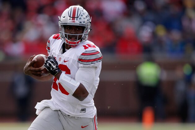 ANN ARBOR, MI - NOVEMBER 28:  Quarterback J.T. Barrett #16 of the Ohio State Buckeyes rushes the ball against the Michigan Wolverines in the third quarter at Michigan Stadium on November 28, 2015 in Ann Arbor, Michigan.  (Photo by Gregory Shamus/Getty Images)