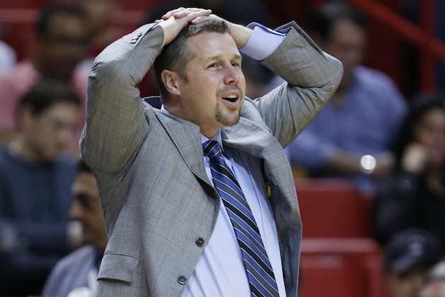 Memphis Grizzlies head coach David Joerger reacts to a call during the second half of an NBA basketball game against the Miami Heat, Sunday, Dec. 13, 2015, in Miami. The Heat defeated the Grizzlies 100-97. (AP Photo/Wilfredo Lee)