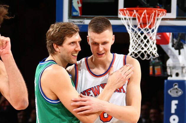NEW YORK, NY - DECEMBER 7:  Dirk Nowitzki #41 of the Dallas Mavericks shakes hands with Kristaps Porzingis #6 of the New York Knicks before the game on December 7, 2015 at Madison Square Garden in New York City, New York.  NOTE TO USER: User expressly acknowledges and agrees that, by downloading and or using this photograph, User is consenting to the terms and conditions of the Getty Images License Agreement. Mandatory Copyright Notice: Copyright 2015 NBAE  (Photo by Nathaniel S. Butler/NBAE via Getty Images)