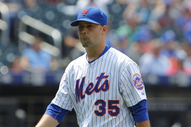 Jun 14, 2015; New York City, NY, USA; New York Mets starting pitcher Dillon Gee (35) reacts while leaving the game in the fourth inning against the Atlanta Braves at Citi Field. Mandatory Credit: Noah K. Murray-USA TODAY Sports