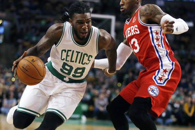 Boston Celtics' Jae Crowder (99) drives past Philadelphia 76ers' Robert Covington (33) during the first quarter of an NBA basketball game in Boston, Wednesday, Nov. 25, 2015. (AP Photo/Michael Dwyer)