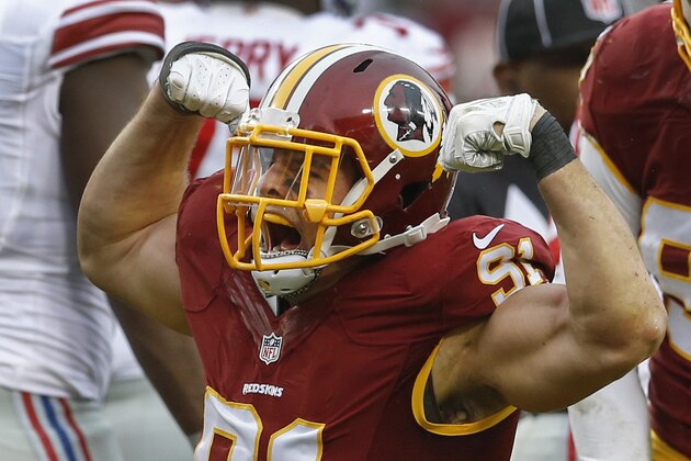 Washington Redskins outside linebacker Ryan Kerrigan (91) celebrates his sack of New York Giants quarterback Eli Manning (10) during the first half of an NFL football game in Landover, Md., Sunday, Nov. 29, 2015. (AP Photo/Patrick Semansky)