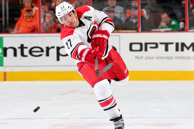 PHILADELPHIA, PA - NOVEMBER 23:  Justin Faulk #27 of the Carolina Hurricanes passes the puck in the first period against the Philadelphia Flyers on November 23, 2015 at the Wells Fargo Center in Philadelphia, Pennsylvania.  (Photo by Elsa/Getty Images)