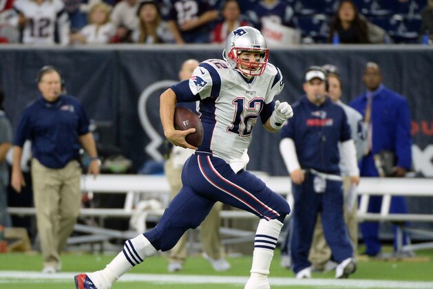 New England Patriots quarterback Tom Brady (12) runs against the Houston Texans during the second half of an NFL football game Sunday,  Dec. 13, 2015, in Houston. (AP Photo/George Bridges)