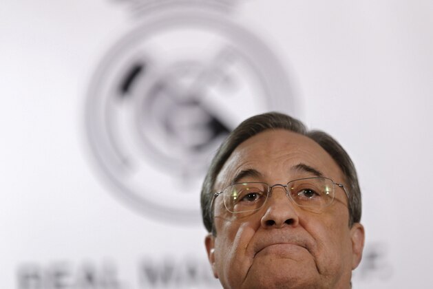Real Madrid's President Florentino Perez listens to a question during a news conference at the Santiago Bernabeu stadium in Madrid, Monday, Nov. 23, 2015. Perez appeared before the press two days after Real Madrid lost 0-4 against rival Barcelona. (AP Photo/Francisco Seco)