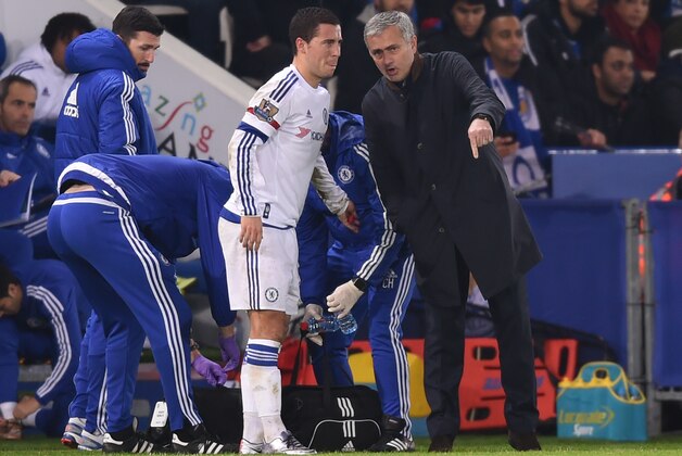 LEICESTER, ENGLAND - DECEMBER 14:  Jose Mourinho the manager of Chelsea speaks with Eden Hazard of Chelsea as he receives medical treatment during the Barclays Premier League match between Leicester City and Chelsea at the King Power Stadium on December14, 2015 in Leicester, United Kingdom.  (Photo by Michael Regan/Getty Images)