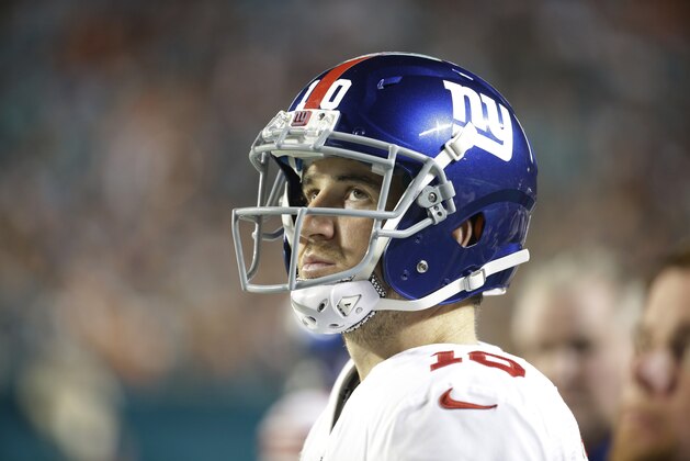New York Giants quarterback Eli Manning (10) looks up during the first half of an NFL football game against the Miami Dolphins, Monday, Dec. 14, 2015, in Miami Gardens, Fla.  (AP Photo/Lynne Sladky)