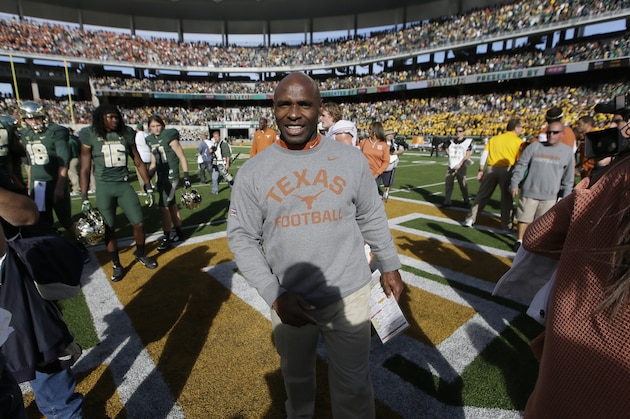 Texas head coach Charlie Strong stands on the field after an NCAA college football game against Baylor Saturday, Dec. 5, 2015, in Waco, Texas. (AP Photo/LM Otero)