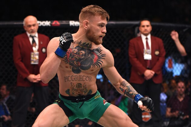 LAS VEGAS, NEVADA - DECEMBER 12:  Conor McGregor of Ireland warms up in the Octagon before facing Jose Aldo of Brazil in their featherweight championship bout during the UFC 194 event inside MGM Grand Garden Arena on December 12, 2015 in Las Vegas, Nevada.  (Photo by Jeff Bottari/Zuffa LLC/Zuffa LLC via Getty Images)