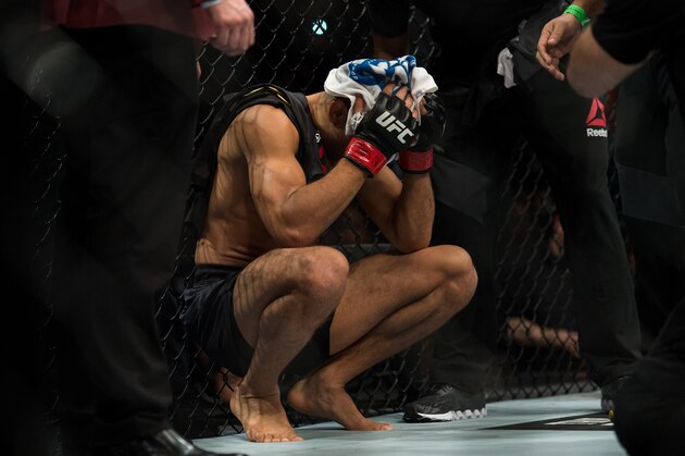 LAS VEGAS, NV - DECEMBER 12:  Jose Aldo reacts to his knockout loss to Conor McGregor in their featherweight championship fight during the UFC 194 event inside MGM Grand Garden Arena on December 12, 2015 in Las Vegas, Nevada.  (Photo by Brandon Magnus/Zuffa LLC/Zuffa LLC via Getty Images)