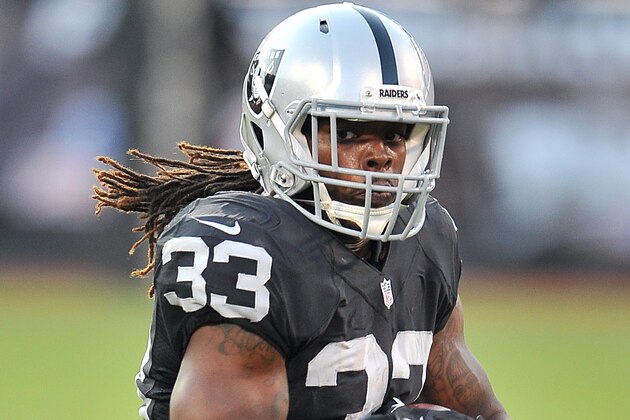 Oakland Raiders running back (33) Trent Richardson in action after catching a pass during a preseason football game against the Arizona Cardinals played at O.co Coliseum in Oakland, Calif. on Sunday, Aug. 30, 2015. (AP Photo/John Cordes)