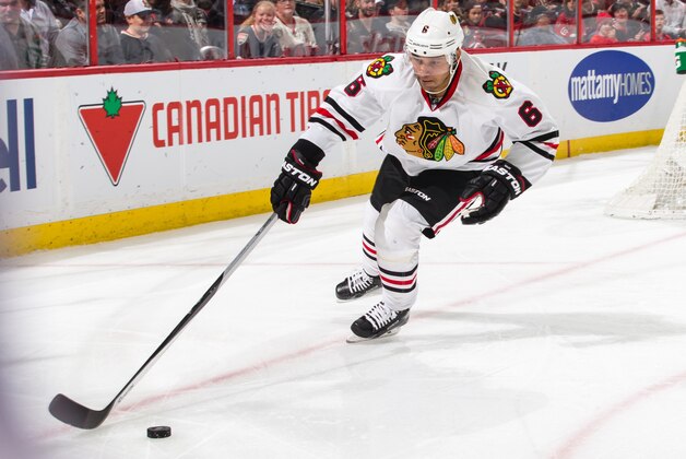 OTTAWA, ON - DECEMBER 3: Trevor Daley #6 of the Chicago Blackhawks corals the puck against the Ottawa Senators during an NHL game at Canadian Tire Centre on December 3, 2015 in Ottawa, Ontario, Canada.  (Photo by Jana Chytilova/Freestyle Photography/Getty Images)