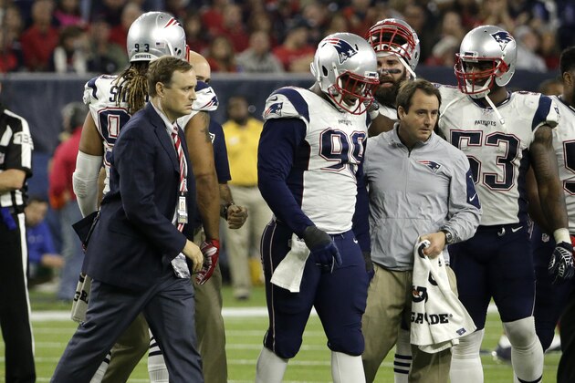 New England Patriots defensive tackle Dominique Easley (99) is assisted off the field after suffering an unknown injury during the second half of an NFL football game against the Houston Texans on Sunday, Dec. 13, 2015, in Houston. (AP Photo/David J. Phillip)