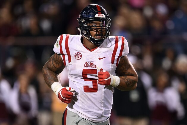 STARKVILLE, MS - NOVEMBER 28:  Robert Nkemdiche #5 of the Mississippi Rebels comes off the field during a game against the Mississippi State Bulldogs at Davis Wade Stadium on November 28, 2015 in Starkville, Mississippi.  Mississippi defeated Mississippi State 38-27.  (Photo by Stacy Revere/Getty Images)