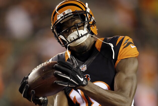 Cincinnati Bengals wide receiver A.J. Green warms up before the start of an NFL football game between the Cincinnati Bengals and the Denver Broncos Monday, Dec. 22, 2014, in Cincinnati. (AP Photo/AJ Mast)