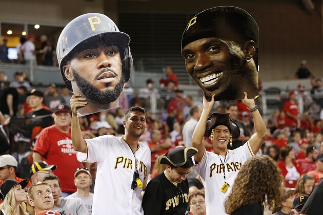 CINCINNATI, OH - SEPTEMBER 26: Pittsburgh Pirates fans hold up fat heads of Josh Harrison and Andrew McCutchen during the game against the Cincinnati Reds at Great American Ball Park on September 26, 2014 in Cincinnati, Ohio. The Pirates defeated the Reds 3-1. (Photo by Joe Robbins/Getty Images)