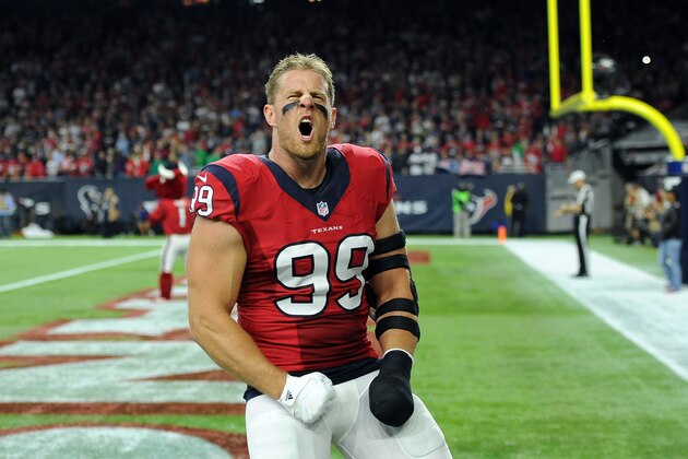 Houston Texans' J.J. Watt (99) shouts in the direction of fans from the end zone before an NFL football game against the New England Patriots on Sunday,  Dec. 13, 2015, in Houston. (AP Photo/George Bridges)