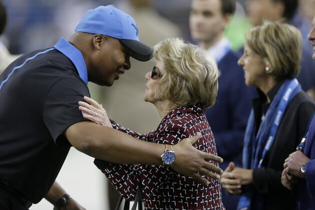Detroit Lions head coach Jim Caldwell greets team owner Martha Ford during pre-game of an NFL football game against the Philadelphia Eagles, Thursday, Nov. 26, 2015, in Detroit. (AP Photo/Carlos Osorio)