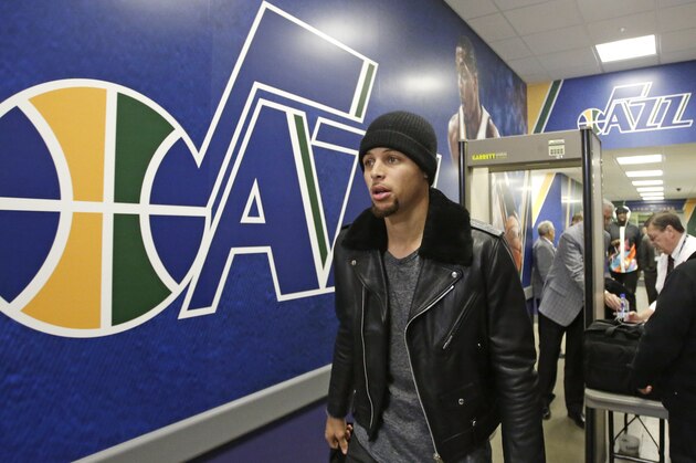 Golden State Warriors guard Stephen Curry arrives before the start of their NBA basketball game against the Utah Jazz Monday, Nov. 30, 2015, in Salt Lake City.  (AP Photo/Rick Bowmer)
