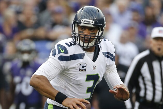 Seattle Seahawks quarterback Russell Wilson looks for a receiver during an NFL football game against the Baltimore Ravens, Sunday, Dec. 13, 2015, in Baltimore. (AP Photo/Patrick Semansky)