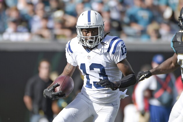 Indianapolis Colts wide receiver T.Y. Hilton (13) runs after a reception past Jacksonville Jaguars strong safety Johnathan Cyprien (37) during the first half of an NFL football game in Jacksonville, Fla., Sunday, Dec. 13, 2015.(AP Photo/Phelan M. Ebenhack)