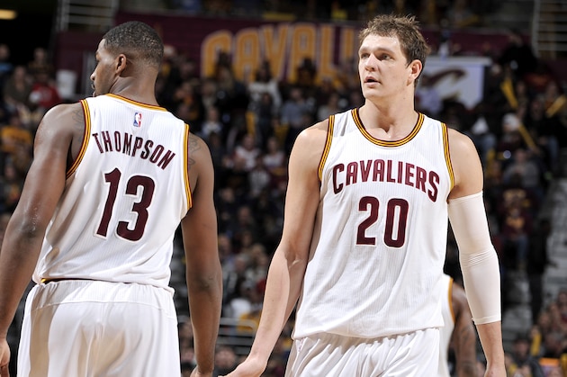 CLEVELAND, OH - NOVEMBER 28: Tristan Thompson #13 and Timofey Mozgov #20 of the Cleveland Cavaliers high five each other during the game against the Brooklyn Nets on November 28, 2015 at Quicken Loans Arena in Cleveland, Ohio.  NOTE TO USER: User expressly acknowledges and agrees that, by downloading and or using this Photograph, user is consenting to the terms and conditions of the Getty Images License Agreement. Mandatory Copyright Notice: Copyright 2015 NBAE (Photo by David Liam Kyle/NBAE via Getty Images)