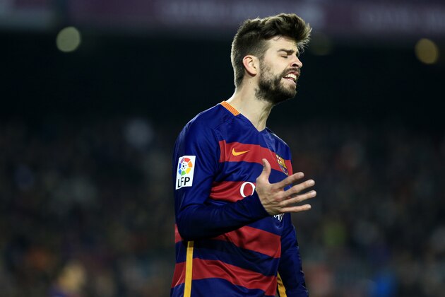 FC Barcelona's Spanish defender Gerard Pique gestures after a failed attempt on goal during the Spanish league football match FC Barcelona vs Deportivo de La Coruna at the Camp Nou stadium in Barcelona on December 12, 2015. AFP PHOTO/ PAU BARRENA / AFP / PAU BARRENA        (Photo credit should read PAU BARRENA/AFP/Getty Images)