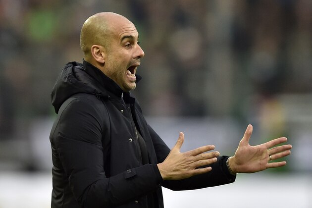 Bayern head coach Pep Guardiola shouts during the German Bundesliga soccer match between Borussia Moenchengladbach and Bayern Munich in Moenchengladbach, Germany, Saturday, Dec. 5, 2015. (AP Photo/Martin Meissner)
