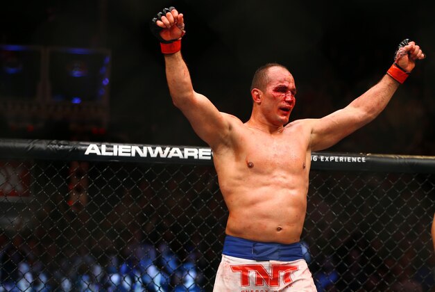 December 13, 2014; Phoenix, AZ, USA; Junior Dos Santos celebrates following his fight against Stipe Miocic (not pictured) during UFC Fight Night at US Airways Center. Mandatory Credit: Mark J. Rebilas-USA TODAY Sports