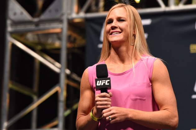 LAS VEGAS, NV - DECEMBER 11:   UFC women's bantamweight champion Holly Holm interacts with fans during a Q&A session before the UFC 194 weigh-in inside MGM Grand Garden Arena on December 10, 2015 in Las Vegas, Nevada.  (Photo by Josh Hedges/Zuffa LLC/Zuffa LLC via Getty Images)