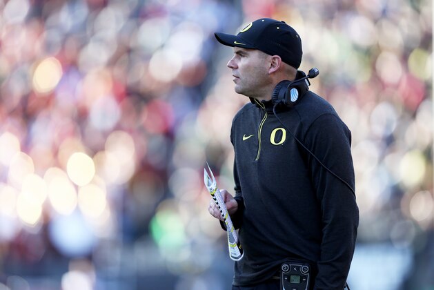 Oregon head coach Mark Helfrich is seen during the first half of an NCAA college football game against Southern California, Saturday, Nov. 21, 2015, in Eugene, Ore. (AP Photo/Ryan Kang)