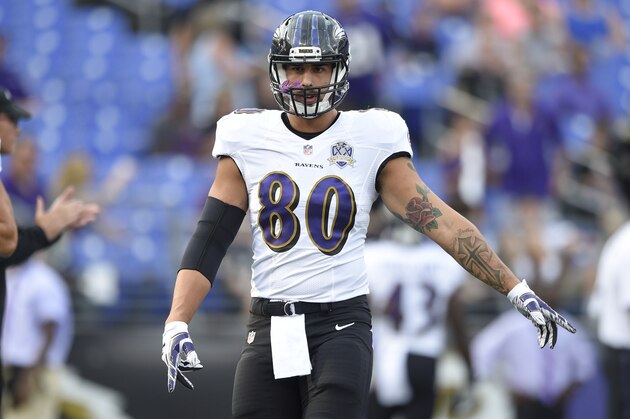 Baltimore Ravens tight end Crockett Gillmore (80) looks on before an NFL preseason football game against the New Orleans Saints, Thursday, Aug. 13, 2015, in Baltimore. (AP Photo/Nick Wass)