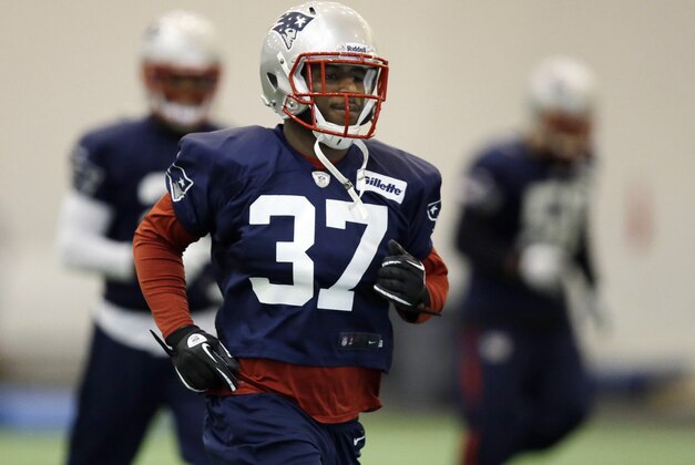 New England Patriots cornerback Alfonzo Dennard runs during a stretching session before NFL football practice at the team's facility in Foxborough, Mass., Tuesday, Jan. 7, 2014. The Patriots are scheduled to host the Indianapolis Colts in an NFL football divisional playoff game on Saturday, Jan. 11. (AP Photo/Stephan Savoia)