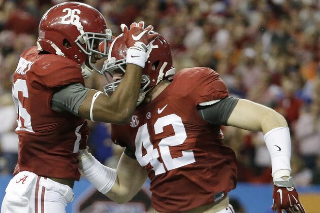 Alabama defensive back Marlon Humphrey (26) and Alabama linebacker Keith Holcombe (42) celebrate an Alabama safety against Florida during the first half of the Southeastern Conference championship NCAA college football game, Saturday, Dec. 5, 2015, in Atlanta. (AP Photo/David Goldman) Alabama defensive back Marlon Humphrey (26) and Alabama linebacker Keith Holcombe (42) celebrate an Alabama safety against Florida during the first half of the Southeastern Conference championship NCAA college football game, Saturday, Dec. 5, 2015, in Atlanta. (AP Photo/David Goldman)