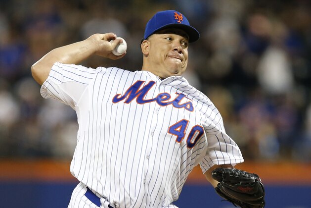 New York Mets starting pitcher Bartolo Colon delivers in the first inning of a baseball game against the Miami Marlins in New York, Wednesday, Sept. 16, 2015. (AP Photo/Kathy Willens)