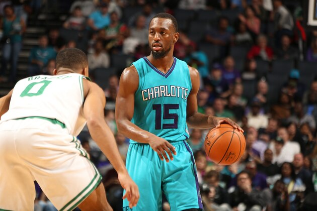 CHARLOTTE, NC - DECEMBER 12:  Kemba Walker #15 of the Charlotte Hornets handles the ball against the Boston Celtics on December 12, 2015 at Time Warner Cable Arena in Charlotte, North Carolina. NOTE TO USER: User expressly acknowledges and agrees that, by downloading and or using this photograph, User is consenting to the terms and conditions of the Getty Images License Agreement.  Mandatory Copyright Notice:  Copyright 2015 NBAE (Photo by Kent Smith/NBAE via Getty Images)