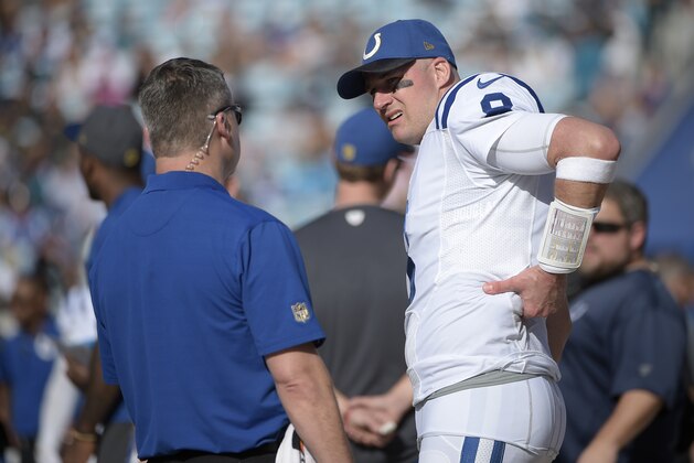 Indianapolis Colts quarterback Matt Hasselbeck (8) talks to staff on the sideline during the first half of an NFL football game against the Jacksonville Jaguars in Jacksonville, Fla., Sunday, Dec. 13, 2015. (AP Photo/Phelan M. Ebenhack)