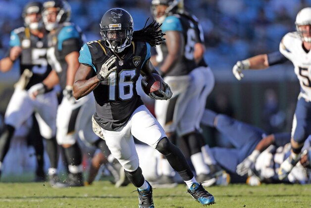 Nov 29, 2015; Jacksonville, FL, USA; Jacksonville Jaguars running back Denard Robinson (16) runs the ball against the San Diego Chargers in the fourth quarter at EverBank Field. The Chargers won 31-25. Mandatory Credit: Jim Steve-USA TODAY Sports